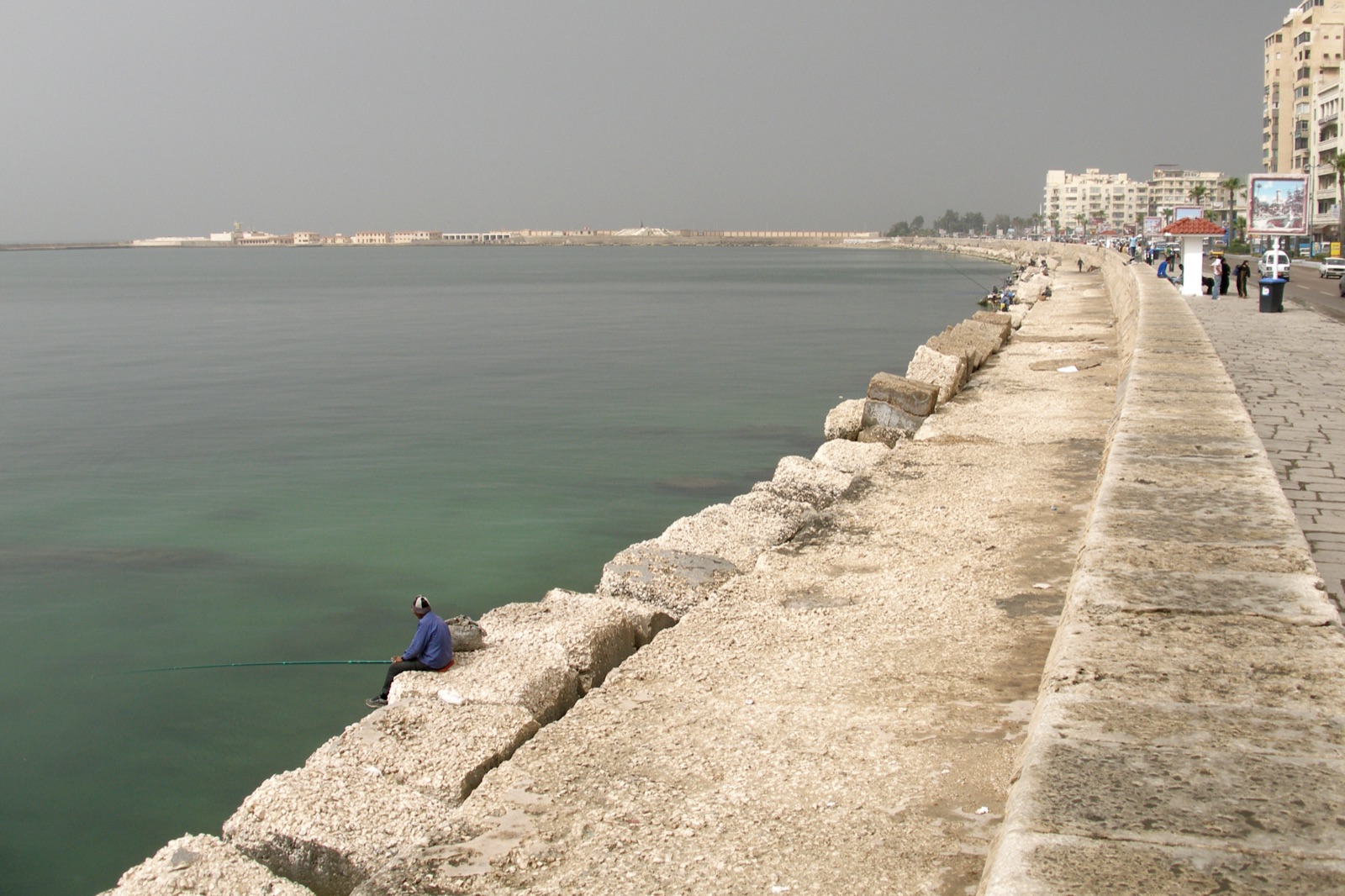 Mediterranean water, sea defences and the Alexandria Corniche viewed along the coast
